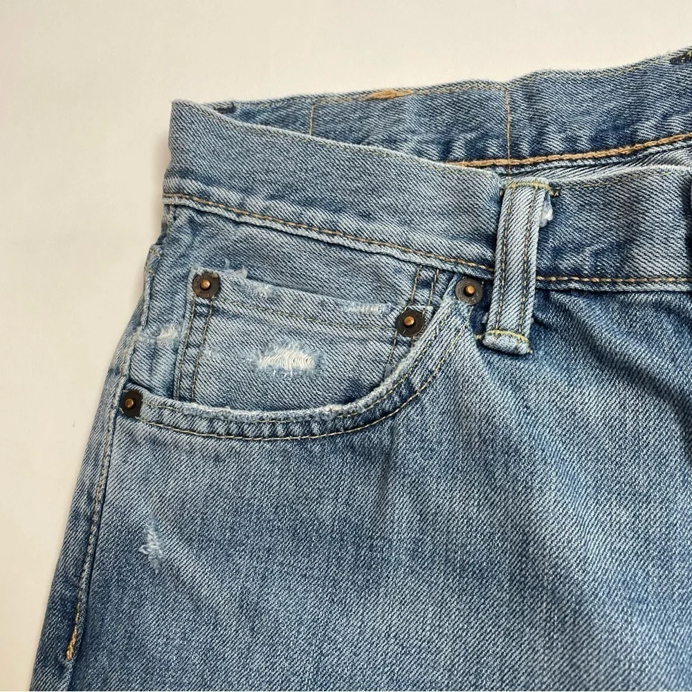 LEVI’S 511 distressed jeans